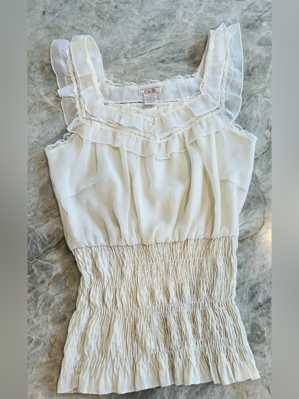 Smocked Ruffle Cream Sleeveless Blouse